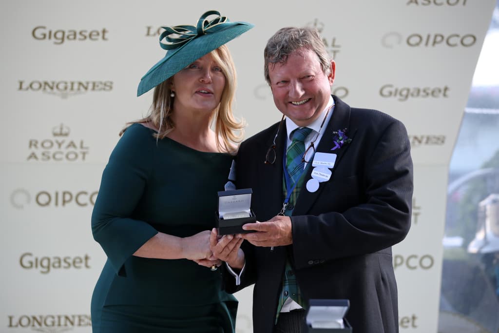 Mark Johnston picking up his prize at Royal Ascot
